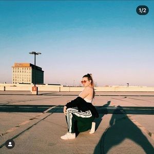 Green track pants